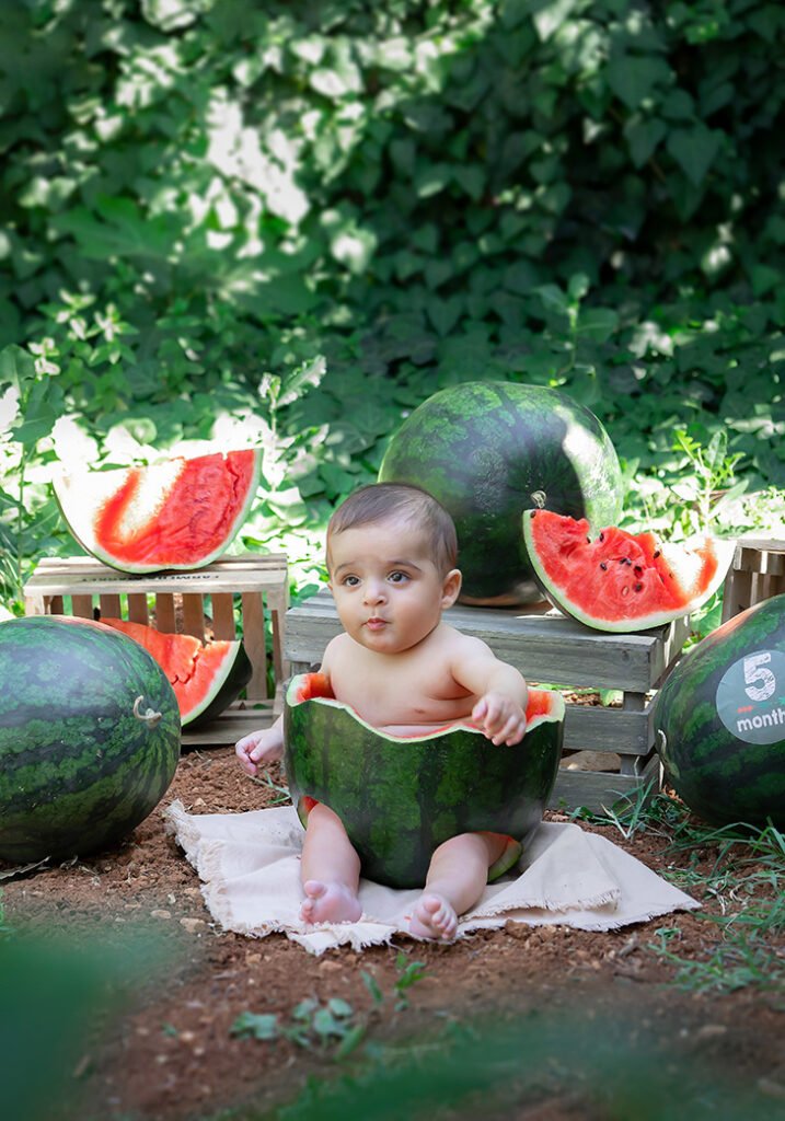 watermelon outdoor photo shoot session summer green garden 5 months old sitter