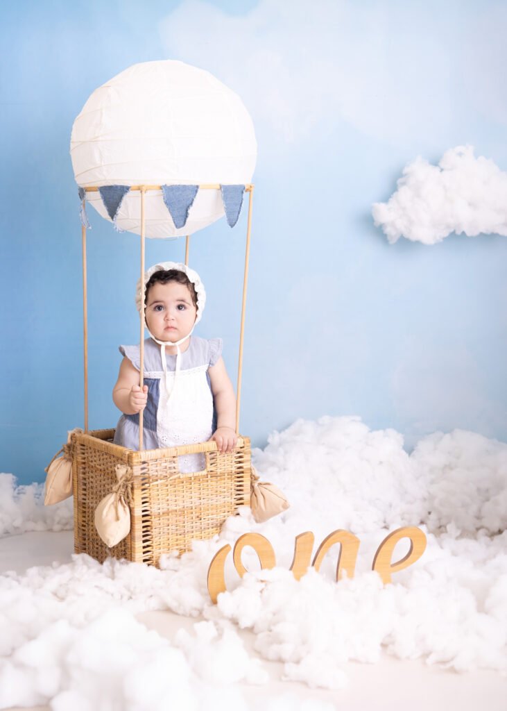 baby photography hot air balloon set up theme blue first birthday sitter milestone amman jordan twins studio indoor photoshoot