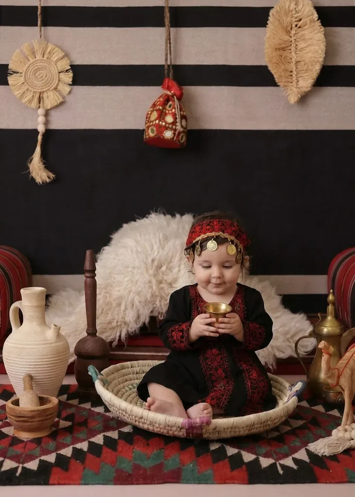 Baby portrait with traditional Jordanian bedouin props — baby photography in Amman