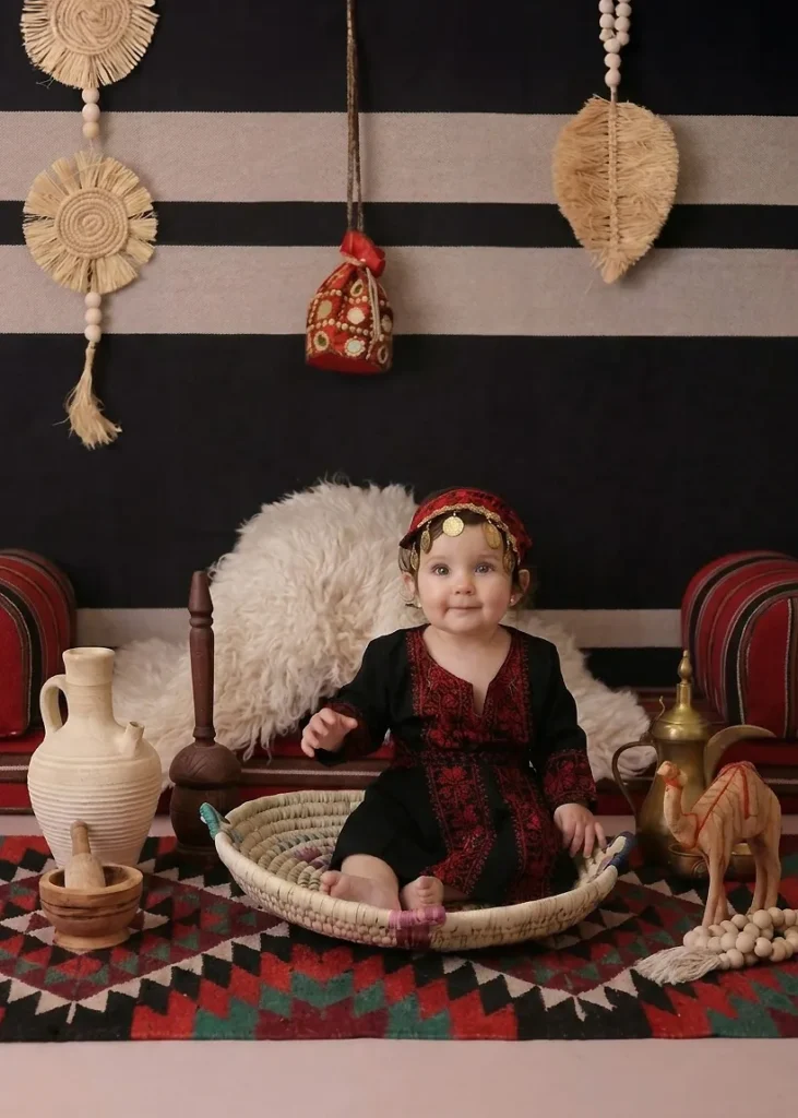 Bedouin soul baby photoshoot with woven textiles and warm desert tones at Soul Studio