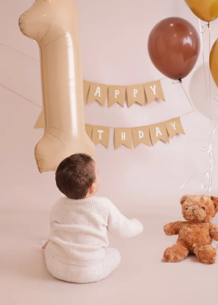 Baby at a simple first birthday photoshoot with minimal styling at Soul Studio in Dabouq, Amman
